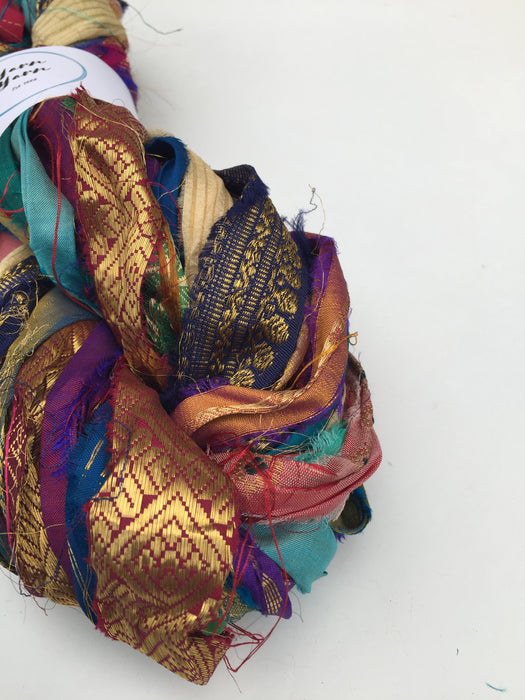 Sari border ribbons, metallic threads.