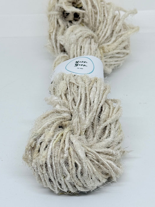 Natural white sari silk yarn.