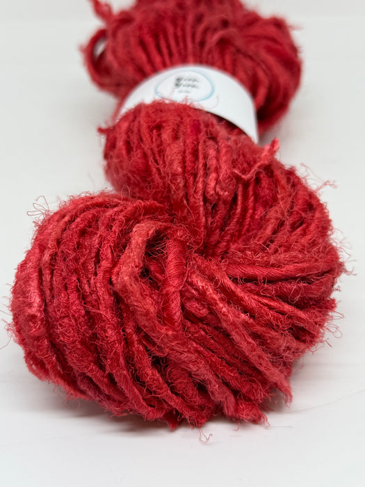 Sari silk yarn, red. Silk yarn.